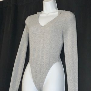 A grey Garage long sleeve bodysuit